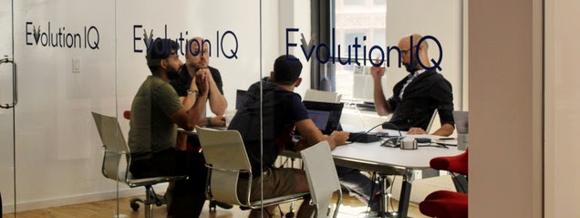 Team working in the EvolutionIQ office